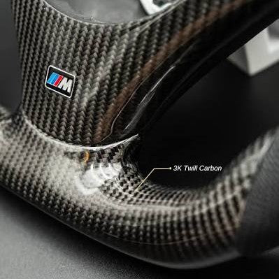 Close-up of a carbon fiber textured steering wheel  upholstery