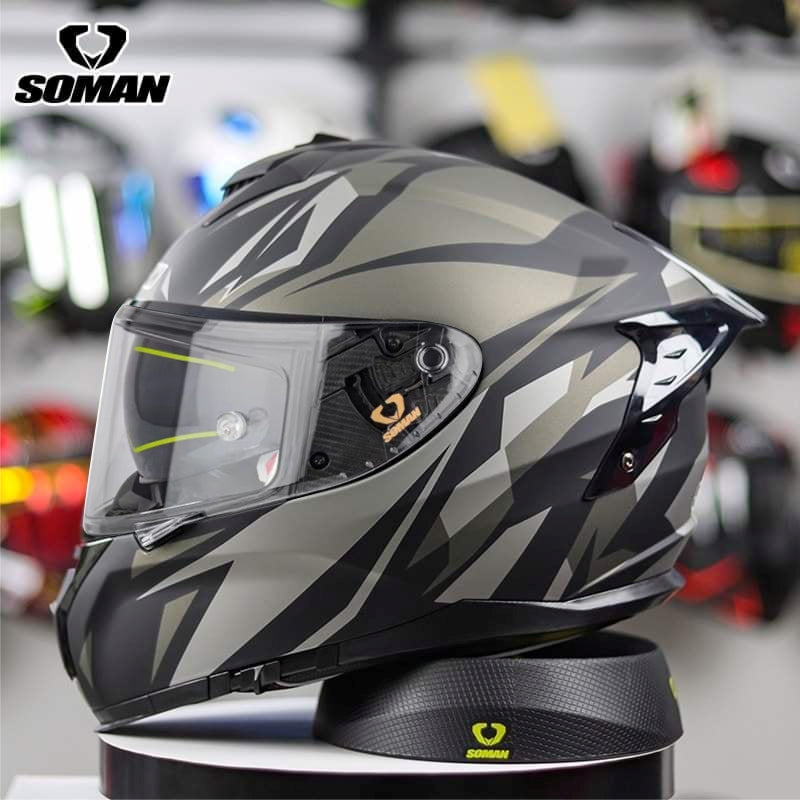 Soman Flash full face motorcycle helmet in sleek grey, designed for aerodynamic performance and full head protection.