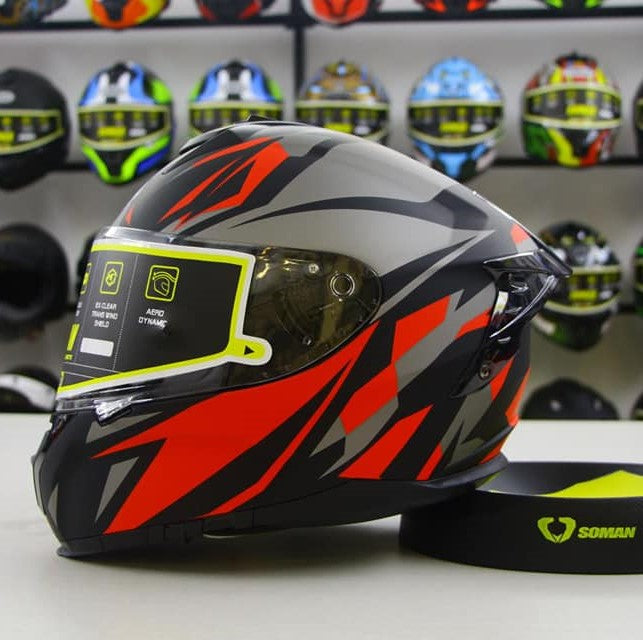 Soman SM961 full face motorcycle helmet in flash red with a sleek design, providing full head coverage and high-impact protection.