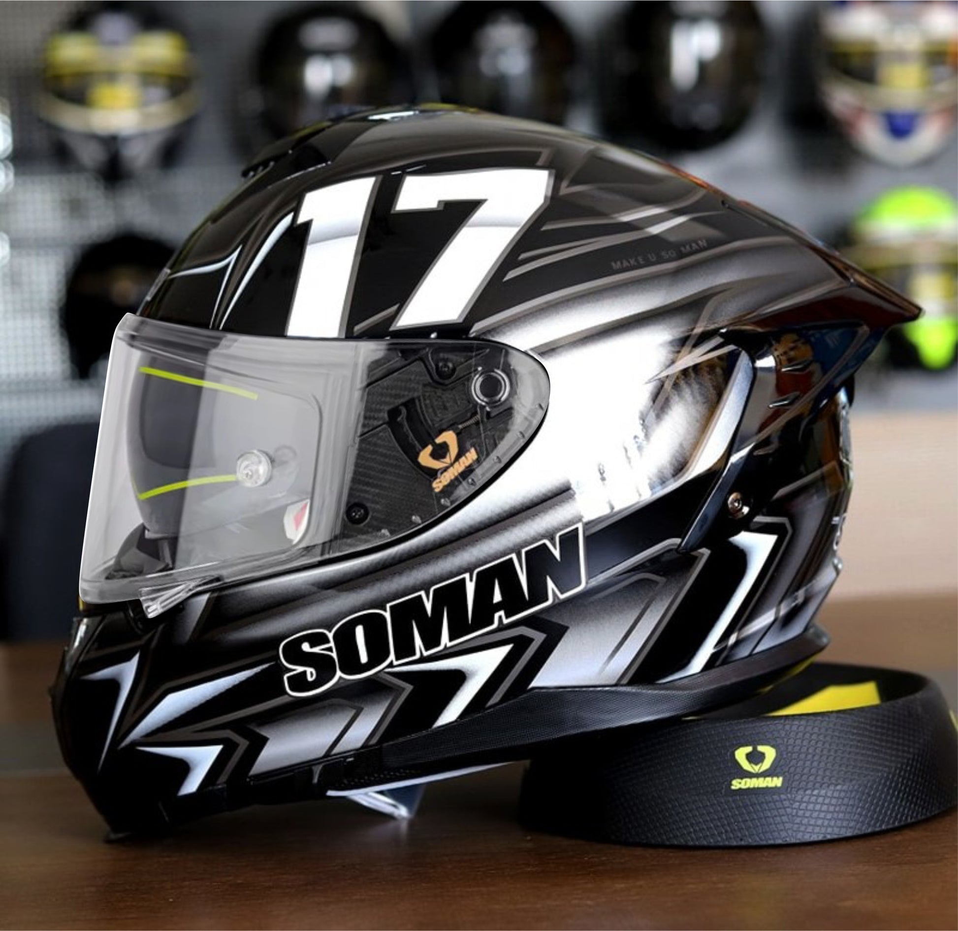 Soman full face motorcycle helmet in grey, white, and black with the number 17, designed for a sporty look and complete rider protection