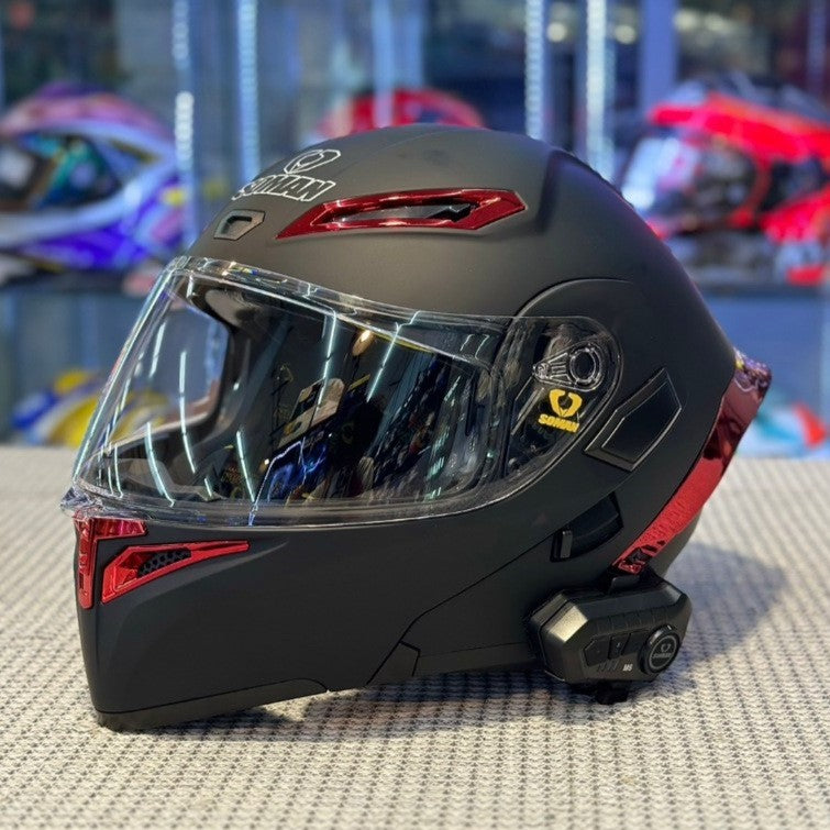 SOMAN Matt Black Modular Helmet with striking red spoiler, sleek aerodynamic design, and clear visor for a sporty and stylish look.